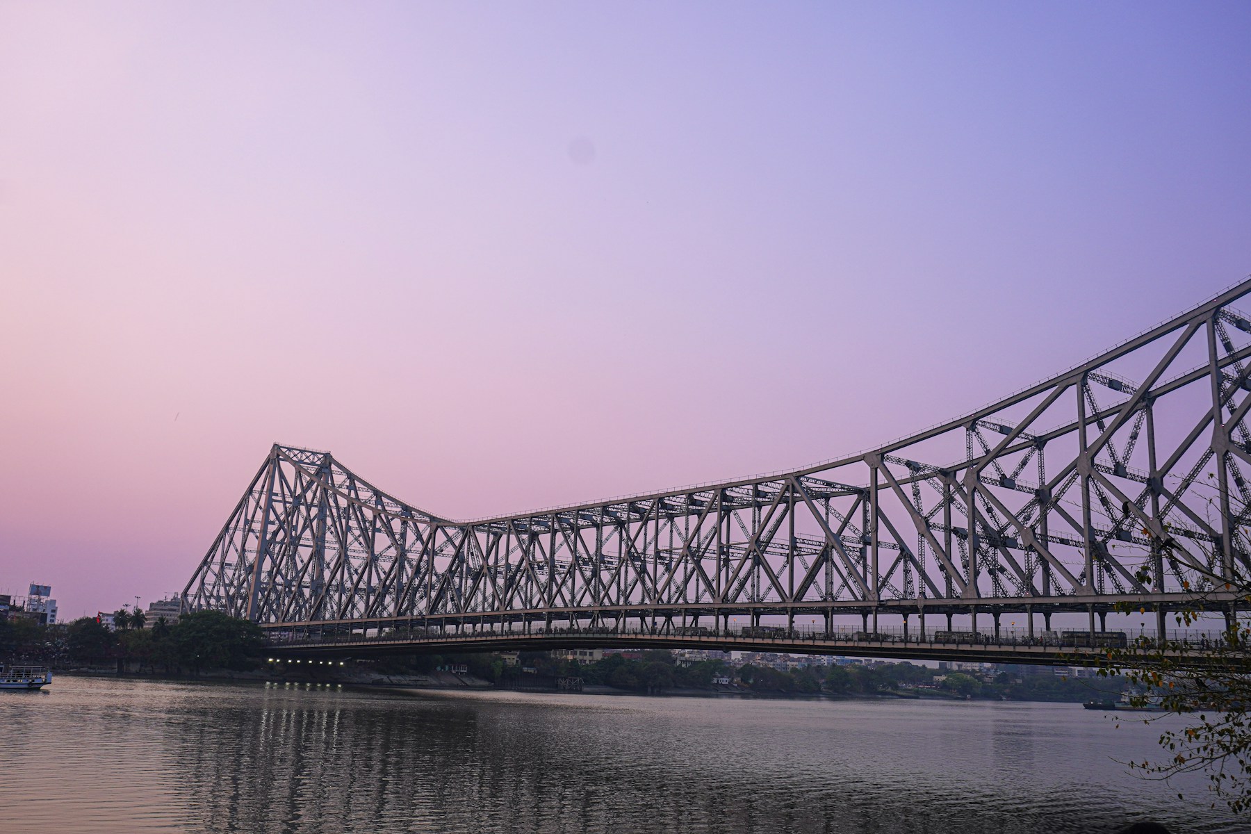 Howrah Bridge over the Hooghly River at dusk, Kolkata